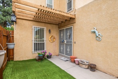 Welcome to your bright, 2-story, end-unit townhome in the Villa on Arroyo Del Oso Golf Course in New Mexico - for sale on GolfHomes.com, golf home, golf lot