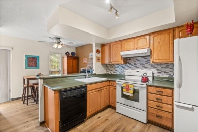 Welcome to your bright, 2-story, end-unit townhome in the Villa on Arroyo Del Oso Golf Course in New Mexico - for sale on GolfHomes.com, golf home, golf lot