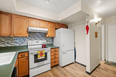 Welcome to your bright, 2-story, end-unit townhome in the Villa on Arroyo Del Oso Golf Course in New Mexico - for sale on GolfHomes.com, golf home, golf lot