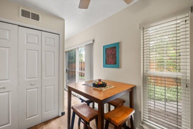 Welcome to your bright, 2-story, end-unit townhome in the Villa on Arroyo Del Oso Golf Course in New Mexico - for sale on GolfHomes.com, golf home, golf lot