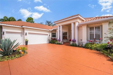 Experience refined luxury and timeless craftsmanship in this on University Park Country Club in Florida - for sale on GolfHomes.com, golf home, golf lot