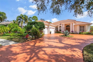 Experience refined luxury and timeless craftsmanship in this on University Park Country Club in Florida - for sale on GolfHomes.com, golf home, golf lot