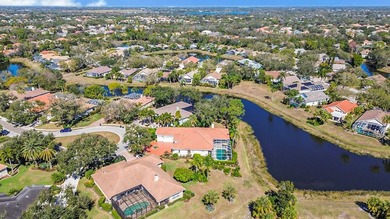 Experience refined luxury and timeless craftsmanship in this on University Park Country Club in Florida - for sale on GolfHomes.com, golf home, golf lot