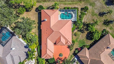 Experience refined luxury and timeless craftsmanship in this on University Park Country Club in Florida - for sale on GolfHomes.com, golf home, golf lot