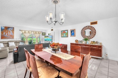 Welcome to this charming 2 bedroom, 2 bathroom ground-floor on Hollybrook Golf and Tennis Club  in Florida - for sale on GolfHomes.com, golf home, golf lot