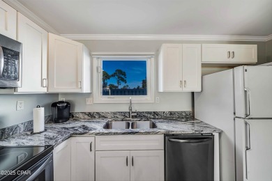 This ground-level, end unit golf villa with no steps in the on Bay Point Resort Golf Club in Florida - for sale on GolfHomes.com, golf home, golf lot
