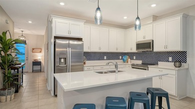 Prepare to be the envy of Lakewood Ranch! This stunning End-Unit on Tatum Ridge Golf Links in Florida - for sale on GolfHomes.com, golf home, golf lot