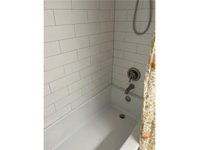 Tucked away on a quiet cul-de-sac, this 2 bed, 2 full-bathroom on Greenbrier Country Club in Virginia - for sale on GolfHomes.com, golf home, golf lot