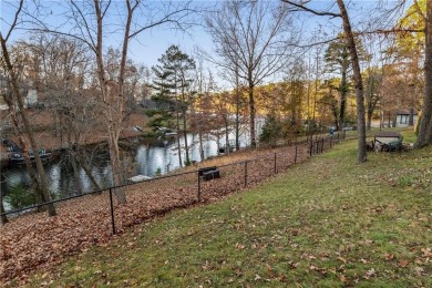 Row, row, row your boat! This home is a dream. Rayburn lakefront on Bella Vista Country Club - Berksdale in Arkansas - for sale on GolfHomes.com, golf home, golf lot