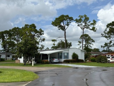 Priced to sell at $42,500 Monthly lot rent is $706 assumable on Pine Lakes Country Club in Florida - for sale on GolfHomes.com, golf home, golf lot