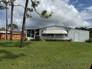 Priced to sell at $42,500 Monthly lot rent is $706 assumable on Pine Lakes Country Club in Florida - for sale on GolfHomes.com, golf home, golf lot