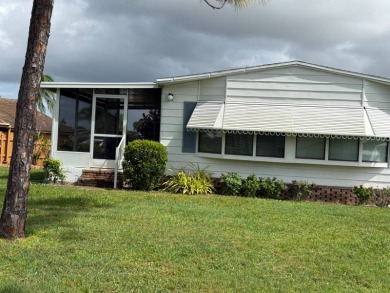 Priced to sell at $42,500 Monthly lot rent is $706 assumable on Pine Lakes Country Club in Florida - for sale on GolfHomes.com, golf home, golf lot