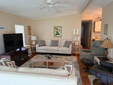 Priced to sell at $42,500 Monthly lot rent is $706 assumable on Pine Lakes Country Club in Florida - for sale on GolfHomes.com, golf home, golf lot