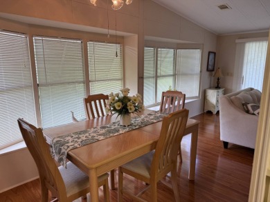 Priced to sell at $42,500 Monthly lot rent is $706 assumable on Pine Lakes Country Club in Florida - for sale on GolfHomes.com, golf home, golf lot