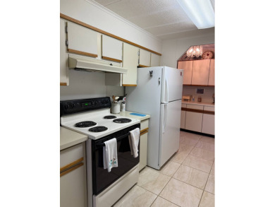 Priced to sell at $42,500 Monthly lot rent is $706 assumable on Pine Lakes Country Club in Florida - for sale on GolfHomes.com, golf home, golf lot