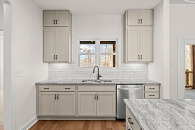 This stunning, brand-new home is officially complete, move-in on Fairfield Plantation Golf and Country Club in Georgia - for sale on GolfHomes.com, golf home, golf lot