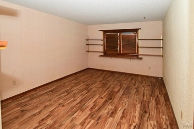 Spacious & Sun-Filled Townhome in Prime Location! Discover the on Desert Hawk At Pueblo West in Colorado - for sale on GolfHomes.com, golf home, golf lot