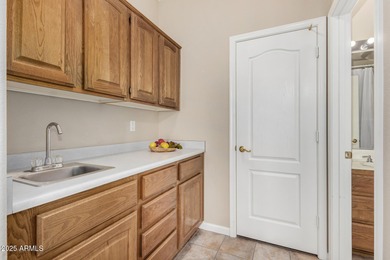 Located in a guard-gated community loaded with amenities! Love on Tuscany Falls At Pebble Creek in Arizona - for sale on GolfHomes.com, golf home, golf lot