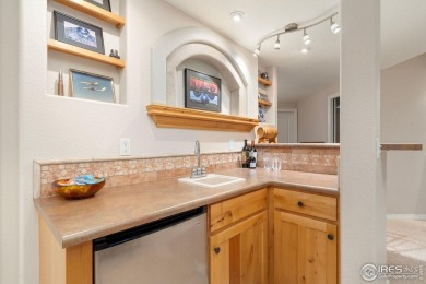 A rare blend of luxury, space, and location, this custom brick on Ptarmigan Golf Course in Colorado - for sale on GolfHomes.com, golf home, golf lot