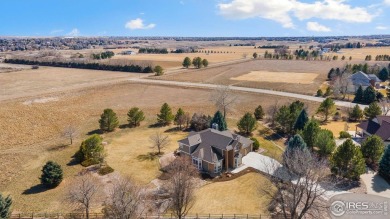 A rare blend of luxury, space, and location, this custom brick on Ptarmigan Golf Course in Colorado - for sale on GolfHomes.com, golf home, golf lot