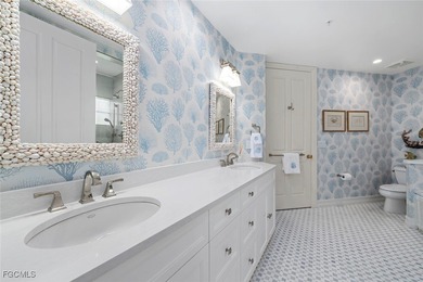 This stunning penthouse offers sweeping views down the 9th on The Sanctuary Golf Club in Florida - for sale on GolfHomes.com, golf home, golf lot