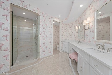 This stunning penthouse offers sweeping views down the 9th on The Sanctuary Golf Club in Florida - for sale on GolfHomes.com, golf home, golf lot