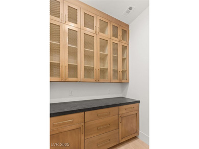 Discover a reimagined luxury masterpiece in guard-gated on TPC Las Vegas in Nevada - for sale on GolfHomes.com, golf home, golf lot