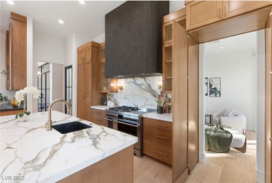 Discover a reimagined luxury masterpiece in guard-gated on TPC Las Vegas in Nevada - for sale on GolfHomes.com, golf home, golf lot