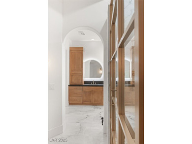 Discover a reimagined luxury masterpiece in guard-gated on TPC Las Vegas in Nevada - for sale on GolfHomes.com, golf home, golf lot