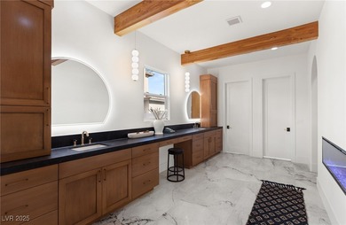 Discover a reimagined luxury masterpiece in guard-gated on TPC Las Vegas in Nevada - for sale on GolfHomes.com, golf home, golf lot