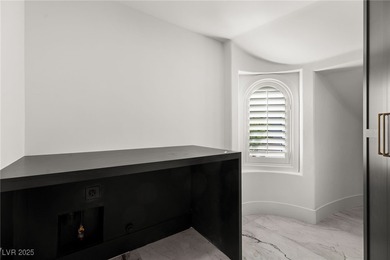 Discover a reimagined luxury masterpiece in guard-gated on TPC Las Vegas in Nevada - for sale on GolfHomes.com, golf home, golf lot