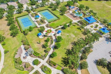 Tucked away on a premium, preserve-view lot, this beautifully on Esplanade Golf and Country at Lakewood Ranch in Florida - for sale on GolfHomes.com, golf home, golf lot