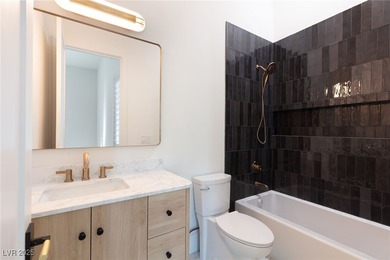 Discover a reimagined luxury masterpiece in guard-gated on TPC Las Vegas in Nevada - for sale on GolfHomes.com, golf home, golf lot