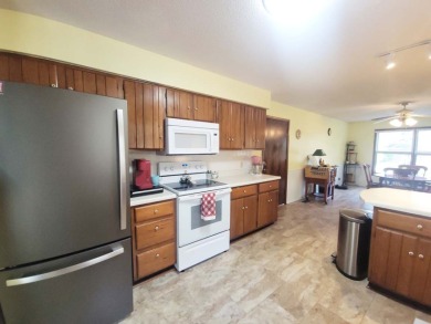 This well-kept ranch on Twin Lakes Golf Club in Arkansas - for sale on GolfHomes.com, golf home, golf lot