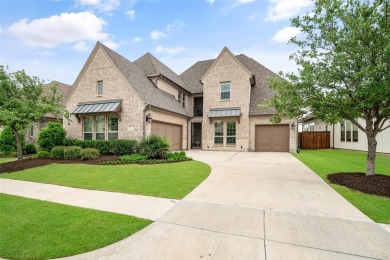 Situated on a beautiful WATER VIEW pond lot, in the desirable on The Tribute At the Colony in Texas - for sale on GolfHomes.com, golf home, golf lot