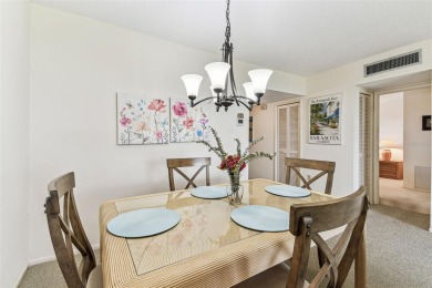 IT'S ALL ABOUT THE VIEW! Come sit and enjoy the view of the 11th on Palm Aire Country Club of Sarasota in Florida - for sale on GolfHomes.com, golf home, golf lot