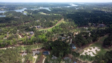 Indulge in opulent living within this custom 5-bedroom, 5.5-bath on Reynolds Lake Oconee - The Oconee in Georgia - for sale on GolfHomes.com, golf home, golf lot