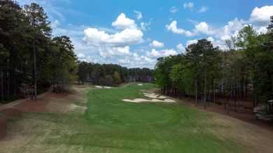 Indulge in opulent living within this custom 5-bedroom, 5.5-bath on Reynolds Lake Oconee - The Oconee in Georgia - for sale on GolfHomes.com, golf home, golf lot