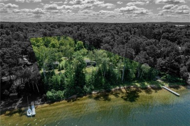 A rare & remarkable opportunity awaits on the shores of Pokegama on Pokegama Golf Course in Minnesota - for sale on GolfHomes.com, golf home, golf lot
