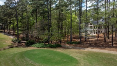 Indulge in opulent living within this custom 5-bedroom, 5.5-bath on Reynolds Lake Oconee - The Oconee in Georgia - for sale on GolfHomes.com, golf home, golf lot
