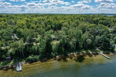 A rare & remarkable opportunity awaits on the shores of Pokegama on Pokegama Golf Course in Minnesota - for sale on GolfHomes.com, golf home, golf lot