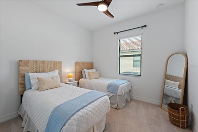 Golf, water, and sunrise views with true backyard privacy! Built on Lakewood National Golf Club in Florida - for sale on GolfHomes.com, golf home, golf lot