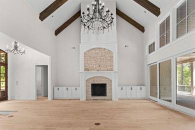 Indulge in opulent living within this custom 5-bedroom, 5.5-bath on Reynolds Lake Oconee - The Oconee in Georgia - for sale on GolfHomes.com, golf home, golf lot