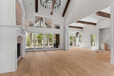 Indulge in opulent living within this custom 5-bedroom, 5.5-bath on Reynolds Lake Oconee - The Oconee in Georgia - for sale on GolfHomes.com, golf home, golf lot