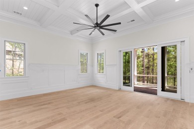 Indulge in opulent living within this custom 5-bedroom, 5.5-bath on Reynolds Lake Oconee - The Oconee in Georgia - for sale on GolfHomes.com, golf home, golf lot