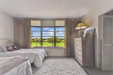 IT'S ALL ABOUT THE VIEW! Come sit and enjoy the view of the 11th on Palm Aire Country Club of Sarasota in Florida - for sale on GolfHomes.com, golf home, golf lot