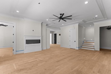 Indulge in opulent living within this custom 5-bedroom, 5.5-bath on Reynolds Lake Oconee - The Oconee in Georgia - for sale on GolfHomes.com, golf home, golf lot