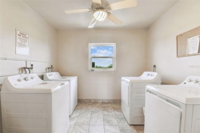 IT'S ALL ABOUT THE VIEW! Come sit and enjoy the view of the 11th on Palm Aire Country Club of Sarasota in Florida - for sale on GolfHomes.com, golf home, golf lot