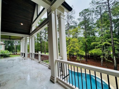 Indulge in opulent living within this extraordinary custom on Reynolds Lake Oconee - The Oconee in Georgia - for sale on GolfHomes.com, golf home, golf lot