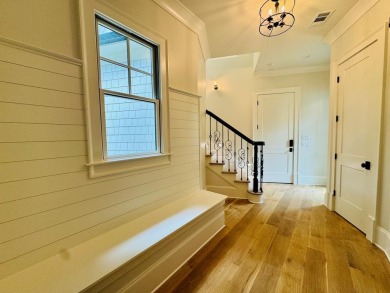 Indulge in opulent living within this extraordinary custom on Reynolds Lake Oconee - The Oconee in Georgia - for sale on GolfHomes.com, golf home, golf lot